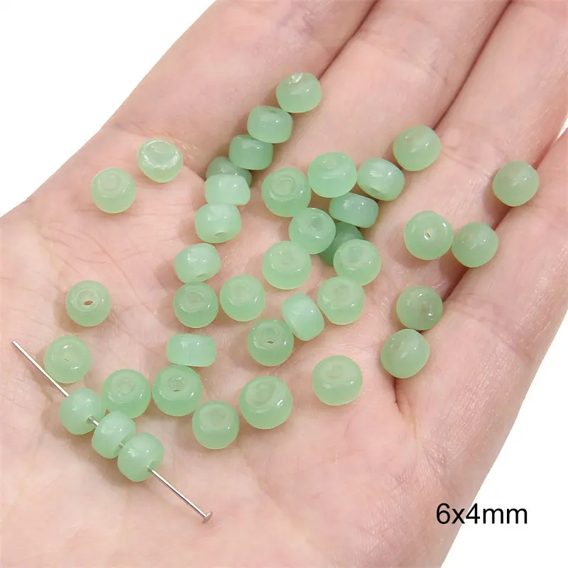 Transparent small beads 6x4mm, jelly green