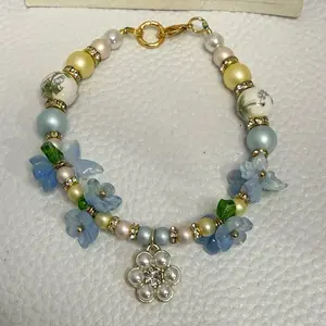 Handmade Flower Charm and Multicolored Bead Bracelet