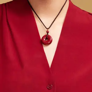 Cinnabar Guardian Vortex Pendant – Ancient Chinese Energy Disc Necklace for Modern Protection & Mindfulness