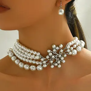 Fashionable geometric women's jewelry set with unique pearl string, niche design necklace, versatile and elegant earrings for casual parties