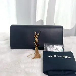 Pre-owned Yves Saint Laurent YSL Black Calfskin Gold Tassel Clutch |21158681