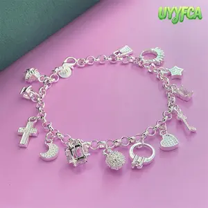 Unisex Vintage Silver Plated Charm Bracelet, 13-Piece Assorted Charms with Cross, Heart, Star and Moon Details, Adjustable Polished Bracelet for Daily Wear and Gifting