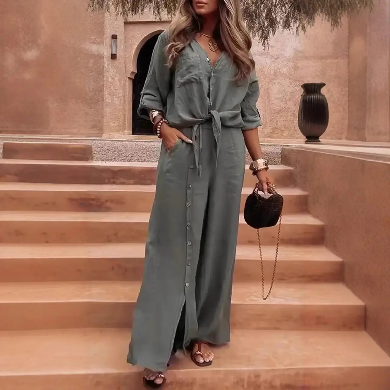 Stylish Women's Two-Piece Set: A solid-colored, mid-length sleeve shirt paired with wide-leg trousers. Lightweight, comfortable, and breathable, this set is the ideal choice for everyday casual wear and outings during the spring and summer seasons.