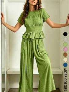 Women's Fashion Casual High-End Textured Cotton Ruffled Short Sleeve Two-Piece Set, with waist-cinching ruffles and a flowing wide-leg pant design, perfect for summer, vacations, indoor, and outdoor wear