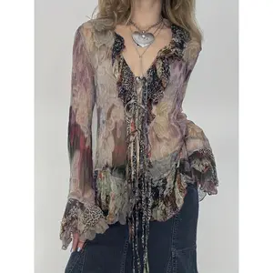 A fairy-style vintage print mesh T-shirt with butterfly sleeves, tie-back, and ruffles, sheer design