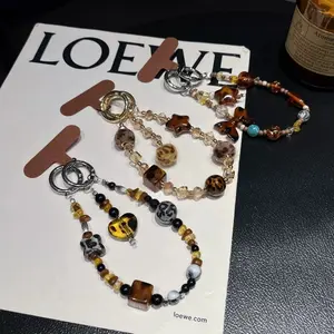 [Lianwang] Brown leopard print mobile phone chain pendant high-end small hairball star pendant unique design wrist rope lanyard new bag pendant retro Maillard fashion chain crystal bracelet beaded wristband case Phone Charms