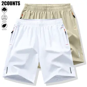 Men's two-piece sports shorts with zippered pockets, solid color, slight stretch, reflective strips on the legs, suitable for night runs, casual beach wear, and everyday hiking or work attire.