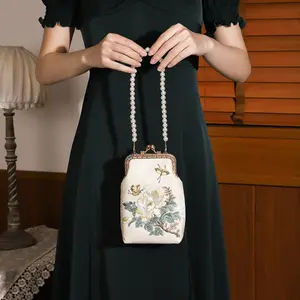 One Dazzling Cheongsam Clutch Bag Timeless Elegance Vintage Embroidered Floral Design with Faux Pearl Chain for Glamorous Banquets and Evening Events Victorian Puzzle Purse
