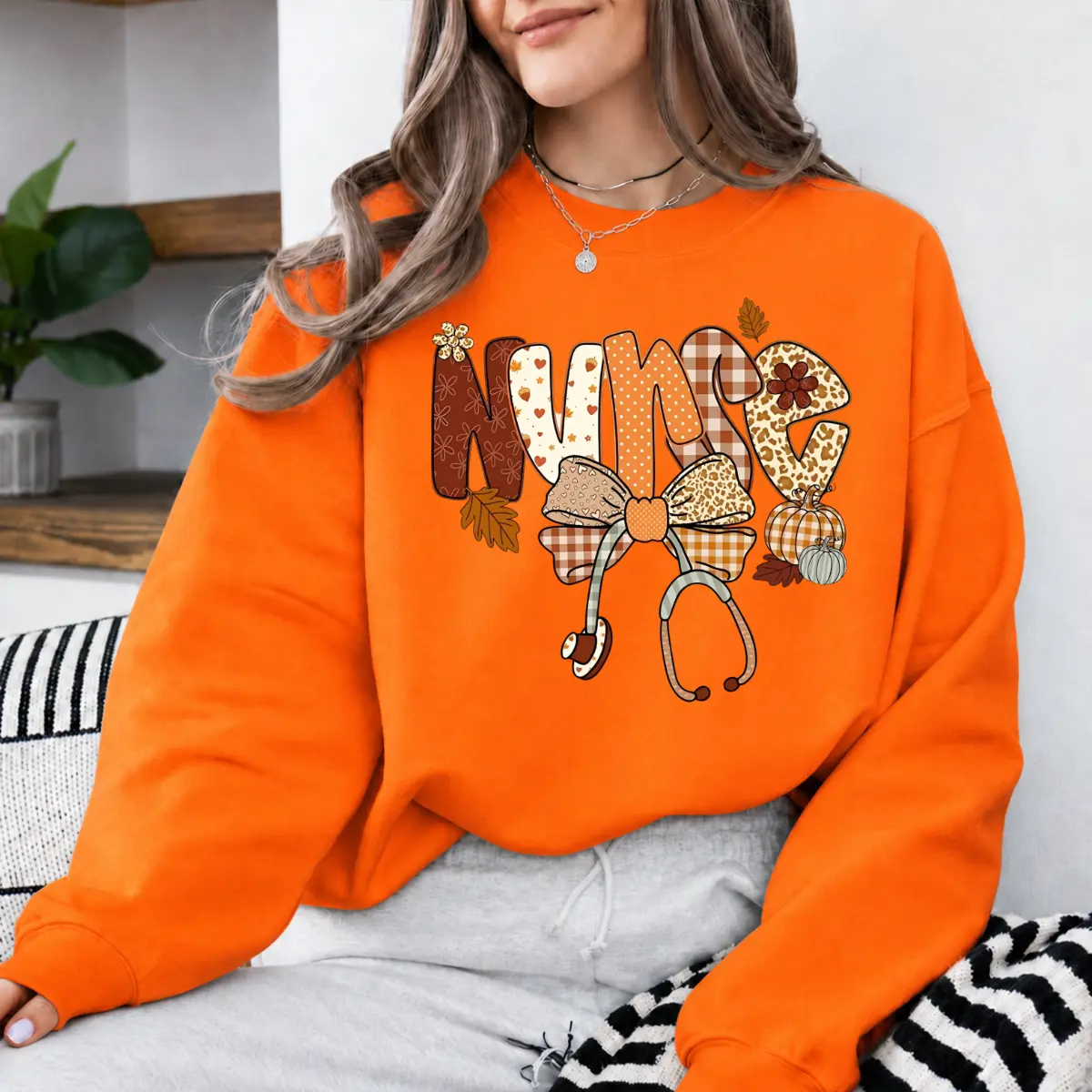 Nurse Fall Pumpkin T-Shirt & Sweatshirt, Cute Autumn Nurse Graphic Tee with Stethoscope Bow, Cozy Thanksgiving Medical Shirt, Seasonal Gift for Nurses - DPCLICK