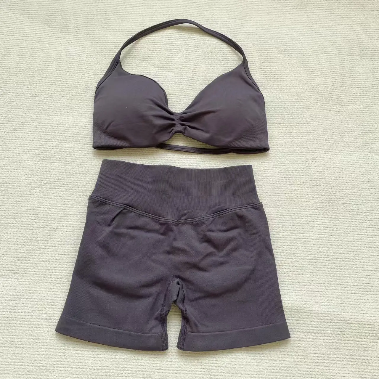 DFYNE halter neck bra with backless design and hip-lifting shorts are highly elastic and won't dig into your skin. They're versatile enough for both workouts and everyday wear. DFYNE halter neck bra with backless design and hip-lifting shorts are highly elastic and won't dig into your skin. They're versatile enough for both workouts and everyday wear.