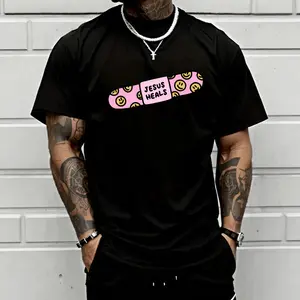 Men’s “Jesus Heals” bandage graphic T-shirt, featuring a cute pink smiley print, made from a soft cotton blend—perfect for faith lovers, fans of quirky styles, and casual, positive everyday outfits. tiktokshopspringglowup,summervibes