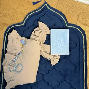4 pc Matching Prayer Sets includes Prayer Mat, Wear, Beads, and a Quran book for Cute Gifts - all sets comes in the eunoia clear bag! Quran may or may not be with colorful pages depending on availability.