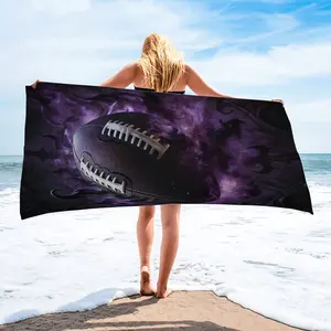 Neon Flames and Purple Mist Football-Print Beach Towel—absorbent and lightweight, perfect for beach trips, camping, and summer music festivals. The ideal gift for football fans, perfect for graduation ceremonies and game nights.