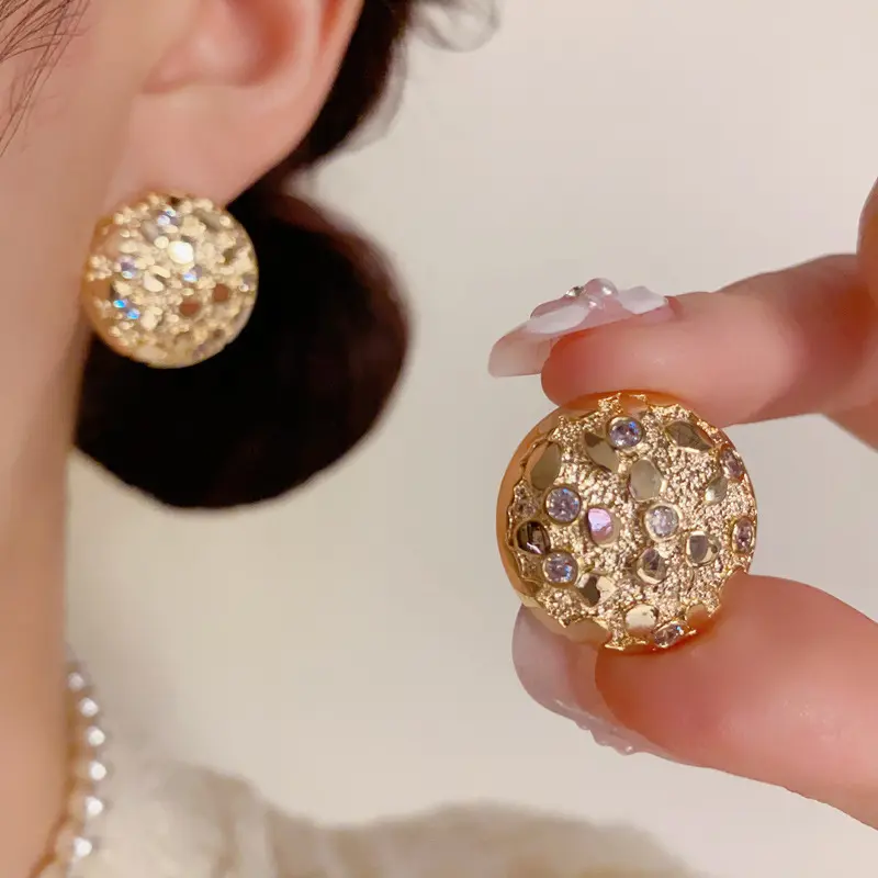 Vintage-style, unique, exaggerated metal round stud earrings with full diamond texture, simple and distinctive, cool and minimalist style for women