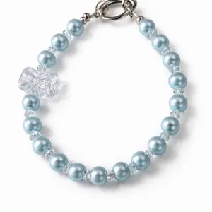 Icy Blue Pearl Butterfly Bracelet with Smooth Pearl-like Beads Crystal Accents & Delicate Charm for Elegant Look