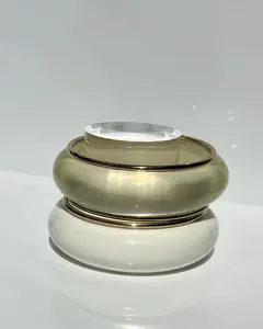 PLASTIC BANGLE WITH GOLD RIM