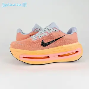 Daily lightweight platform trainer sneakers use seamless soft breathable knit mesh upper, uniform coral orange knit base with gradient peach air cushion pockets, perforated mesh ventilation, flexible full air midsole