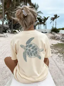 TikTok Viral 2026 Women's Oversized Casual Sea Turtle Graphic T-Shirt - Back Print Coastal Marine Life Short Sleeve Crew Neck Tee - Y2K Coquette Aesthetic Beachwear,Vacation, Beach, Brunch, Daily Wear - Trendy Summer Outfits for Teen Girls & Young Women