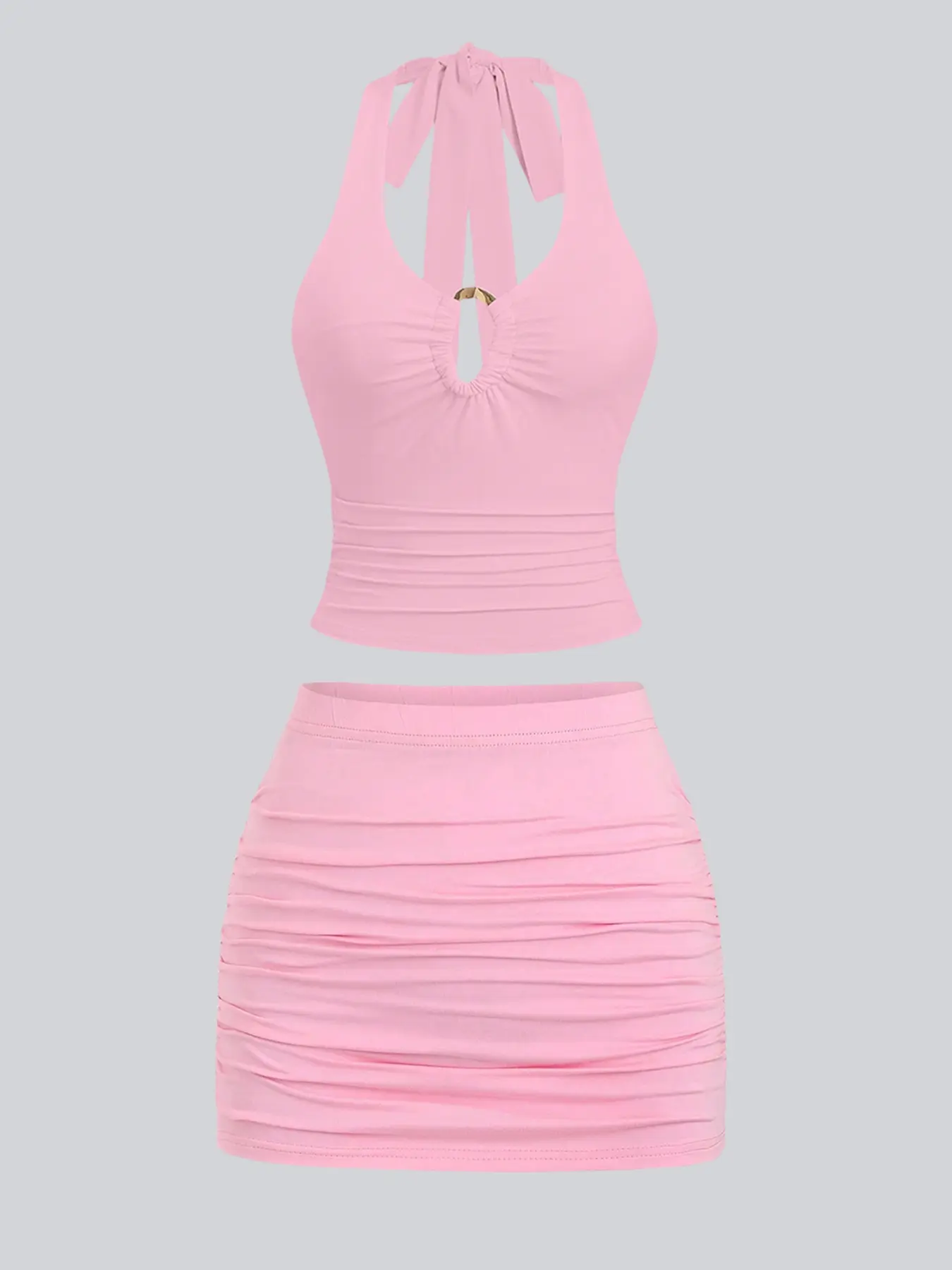 Halterneck spaghetti strap crop cami with ruched details, metal clasp tie, and open back. Fitted ruched mini skirt.Sexy and comfortable - perfect for beach days and casual outings.