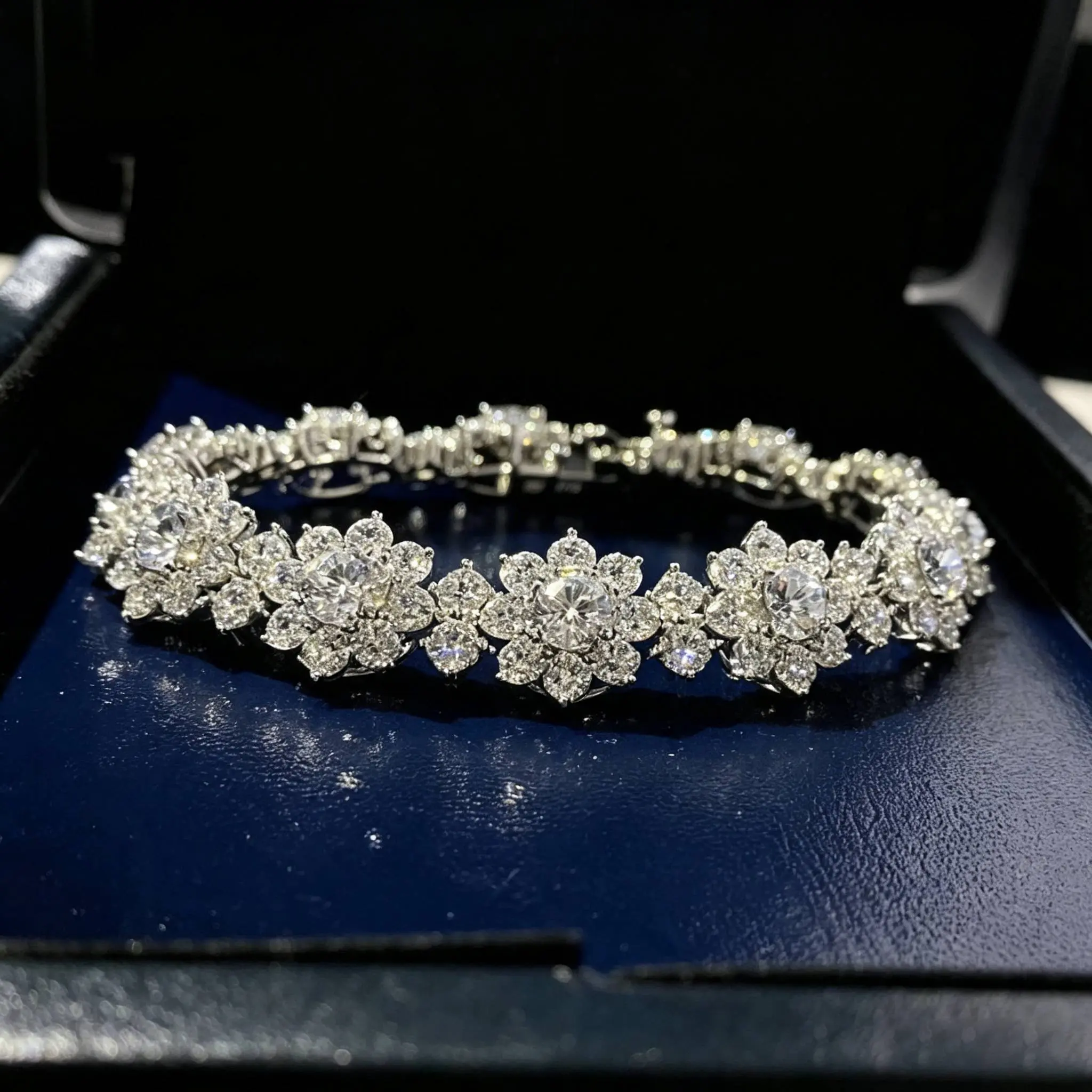 Elegant Floral Design Bracelet with Sparkling Stones in a Luxurious Silver Tone Finish