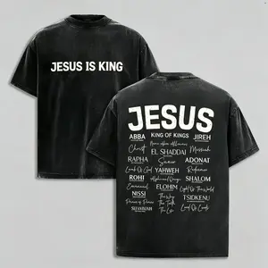 Vintage washed black oversized men’s tee featuring bold front print “JESUS IS KING” & back full list of God’s holy names: ABBA, ELOHIM, YAHWEH, JIREH & more. Soft thick cotton loose fit Christian streetwear shirt, trendy faith graphic top for church,