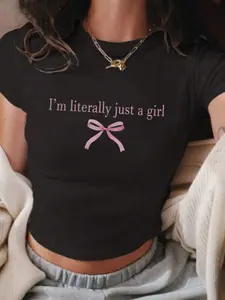 Black Cropped "I'm Literally Just A Girl" Bow Graphic Tee - Sweet Vibe Top, 2026 Trending Streetwear, Soft Fabric Perfect for Daily Outings & Dates, Bold Relaxed Slogan That Stands Out, Versatile Slim Fit