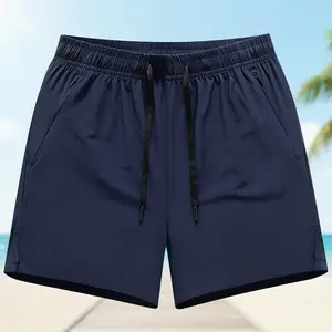 Men’s summer shorts — American retro high-street fashion, versatile solid color, minimalist loose straight cut, drawstring elastic waistband, zippered pockets; casual athletic commuter basic men’s shorts