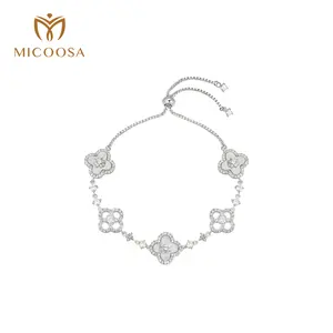 MICOOSA Silver-Tone Clover CZ Bracelet for Women - White Shell & Sparkling Cubic Zirconia Link Bracelet - Adjustable Drawstring Closure Fashion Jewelry