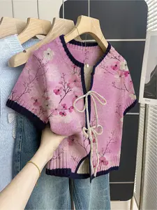 Women's khaki bohemian ethnic short-sleeve knit top. Loose round neck, purple patchwork floral print, front tie design, contrast piping. Comfortable for spring & summer casual wear. Womenswear