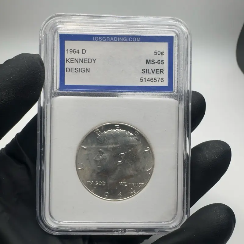 a 1964-D Kennedy Half Dollar graded MS-65 (Mint State 65) by IGS