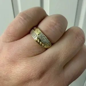 Elegant Gold Plated Ring for Women with Intricate Design and Sparkling Center Stone