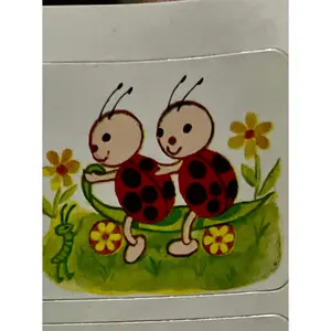 Vintage Ladybugs Riding on a Leaf