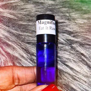 MagnifiSCENTS Eatit Raw Purple Unisex Perfume Oil - Elegant Scent with Unexplainable Effects - Blue Bottle