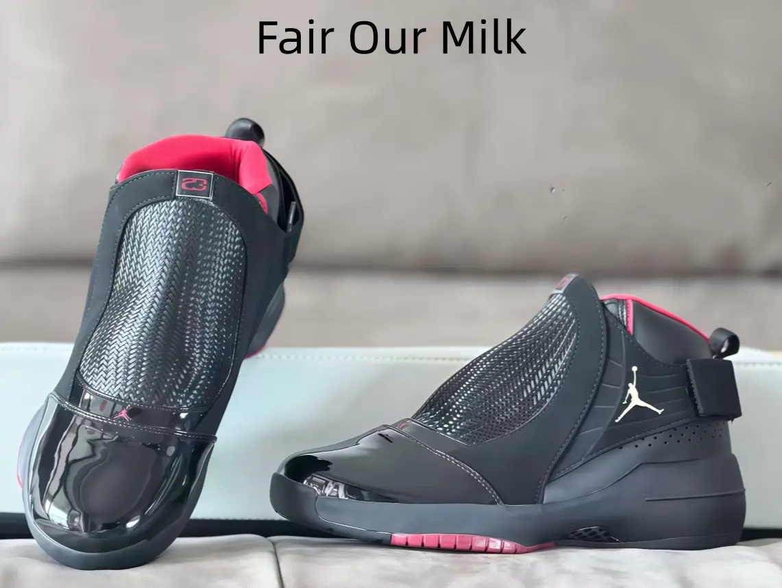 Mid-top basketball sneakers with black knit upper and red lining. Patent leather toe cap and adjustable strap bring comfort for sports and daily streetwear.