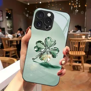 Crystal four-leaf clover pattern, skin-friendly feel, glass texture, white light glass phone case, suitable for iPhone 17, 16, 15, 14, 13, 12, 11, Samsung and other series models, can be given as a gift to friends or family.