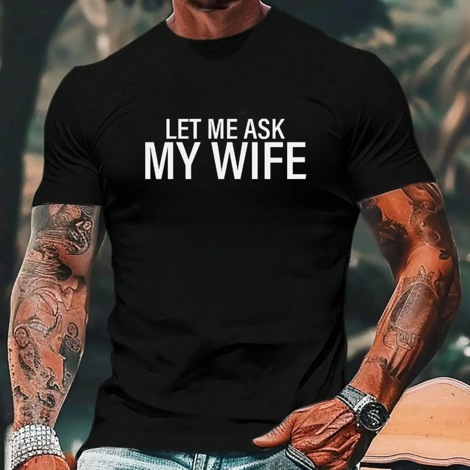 Black Cotton T-Shirt Featuring The Humorous Quote "LET ME ASK MY WIFE" in White Bold Font
