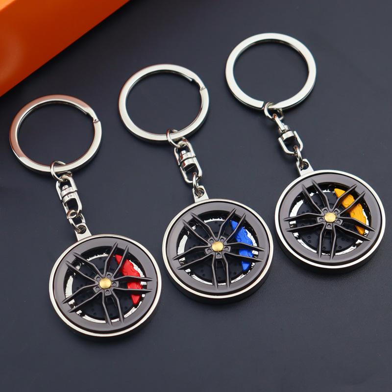 Hub Keychain Car Wheel Design Keyring Hub Zinc Alloy Lightweight Compact Rotatable Decompressing Toy 9.2x3.5x0.6cm