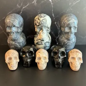 Various crystal carved skulls polished