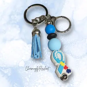 Charmingly Resilient Autism Awareness Keychain with Blue Tassel and Beads for Support and Remembrance