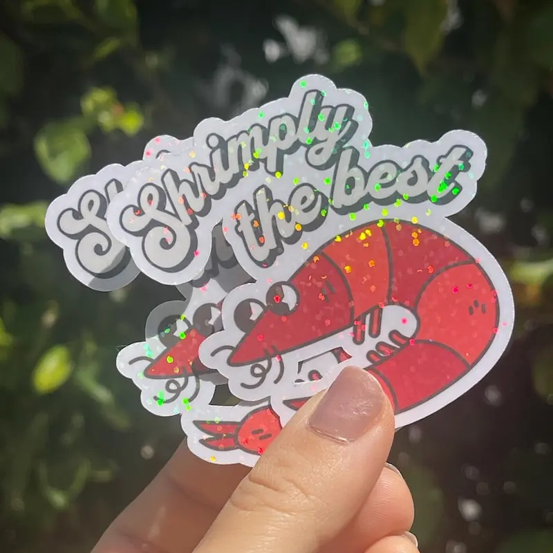 Holographic Shrimp Sticker, Water Resistant "Shrimply the Best" Vinyl Sticker for Laptops and Water Bottles