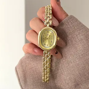 PASOY Elegant Women’s Gold Bracelet Watch Bling Bling Slim Oval Case with Roman Numeral Dial Quartz Movement Alloy Band refined fashion accessory that completes office outfits, evening dresses and casual looks. gift for birthdays, anniversaries holidays.