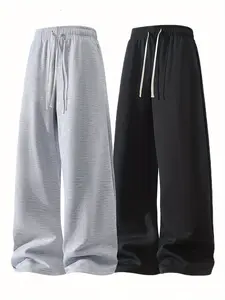 Pack of 2 solid-color men’s loose straight-leg pants for spring and autumn fitness/sports wear. Knit fabric is soft with slight stretch, drawstring waist, side pockets, suitable for outdoor casual and athletic styles in spring and fall, wearable year-roun