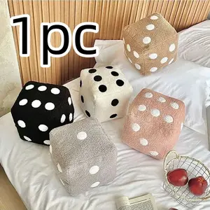 These dice-shaped throw pillows are soft, fluffy, and adorned with black polka dots. A cute and unique decorative pillow suitable for bedrooms, living rooms, and game nights.