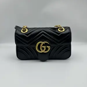 Pre-owned GUCCI h9 GG Marmont collection small black and gold chevron quilted flap bag 71759