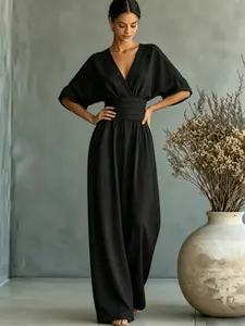 Summer new fashionable and high-end V-neck one-piece wide leg pants with cinched waist for slimming effect. Bubble sleeve design is suitable for daily travel, outdoor lawn banquets, light wedding outfits, afternoon tea, commuting