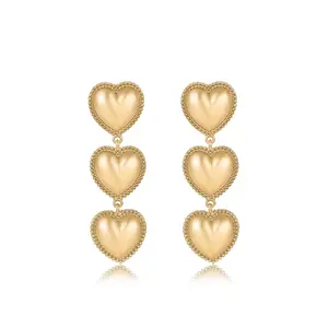 Ettika Golden Love Drop Dangle Earrings Gold Finish Heart-Shaped Design 18kt Gold Plating Zinc Durable Everyday Wear 2.65 Inches Long