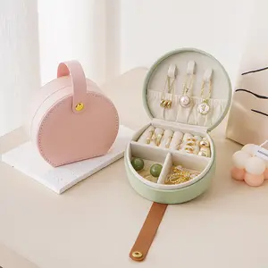 Custom-designed Round PU Leather Travel Jewelry Box Compact Portable Ideal for Storing Earrings Rings Necklaces on the Go White Pink Green