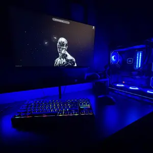 DIYPC ARGB-DC200-BK Black Dual USB3.0 Tempered Glass ATX Gaming Computer Case w/ 4 x ARGB PWM Fans (Pre-Installed) and ARGB Light Strip at Bottom.