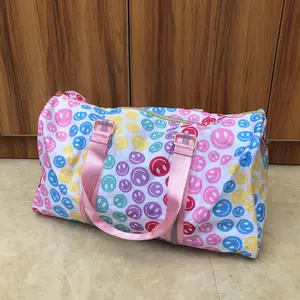 Colorful smile design Duffle bags