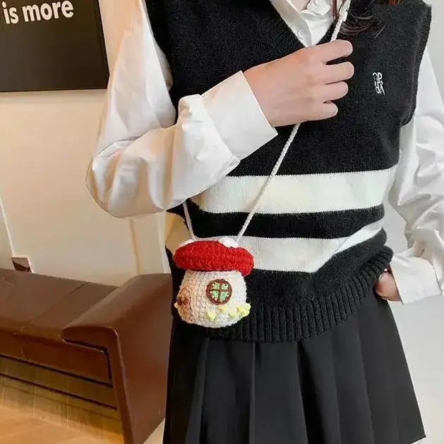 3D Mushroom House Mini Drawstring Crossbody Bag—a soft, knitted shoulder bag featuring a whimsical, pastoral fairy-tale style. This cute, compact, and portable bag is perfect for girls' daily outdoor play and casual gatherings.